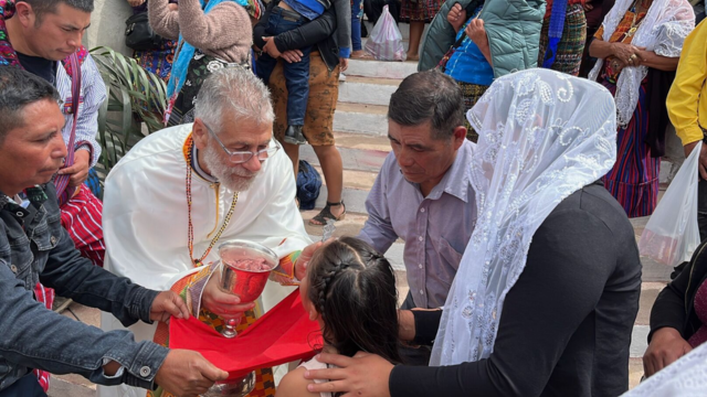 Guatemala Seminary Ceremony - Fr. Martin Giving Communion